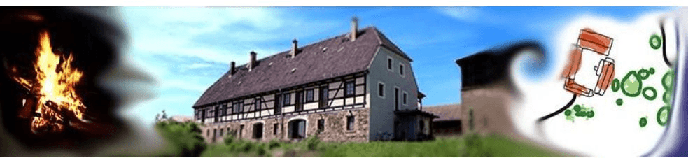 Der historische Vierseithof in Niedermuschütz — Feuerstelle, Hofgebäude und Kräuterwelt